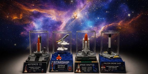 A lineup of three rockets and the infamous space shuttle