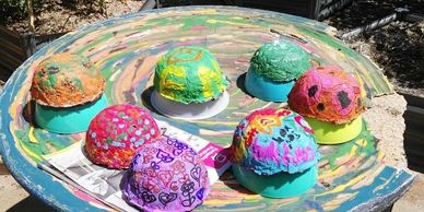 Beautiful and colourful paper mache bowls  drying in the sun at Elizabeth Rise Community Centre.

