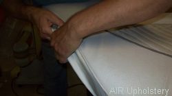 Re-upholstering the repaired sun deck