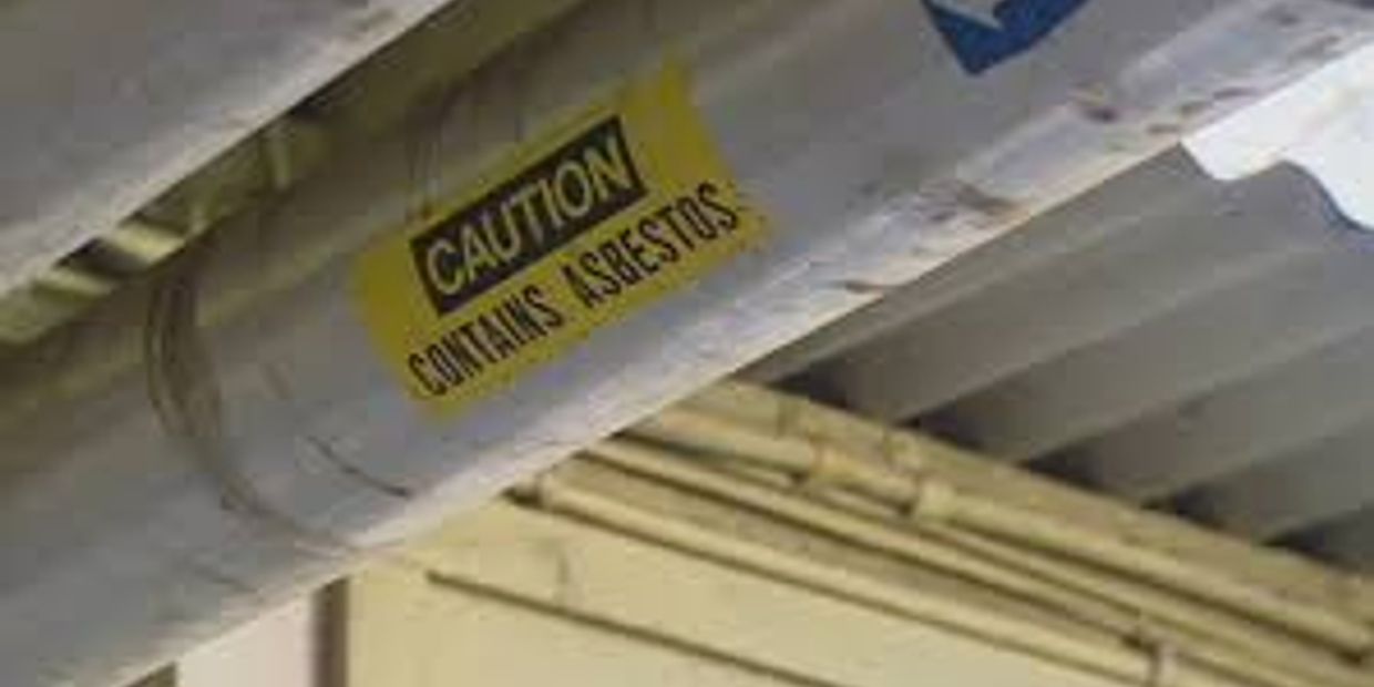 Pipe covered in asbestos-containing material