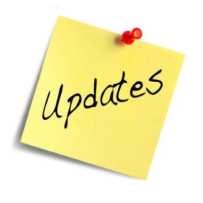 Yellow sticky note with the word 'Updates' pinned.
