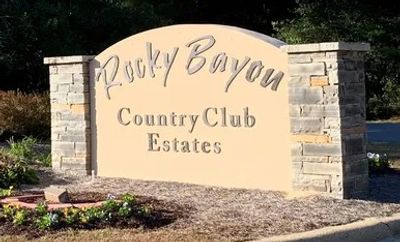 Entrance sign for Rocky Bayou Country Club Estates.