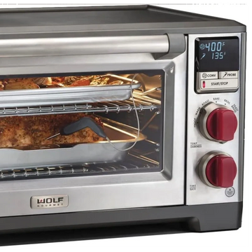 Wolf convection oven for counter-top with red knobs