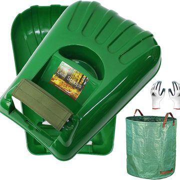 A pair of green leaf scoopers and large green tote bag for leaves and debris