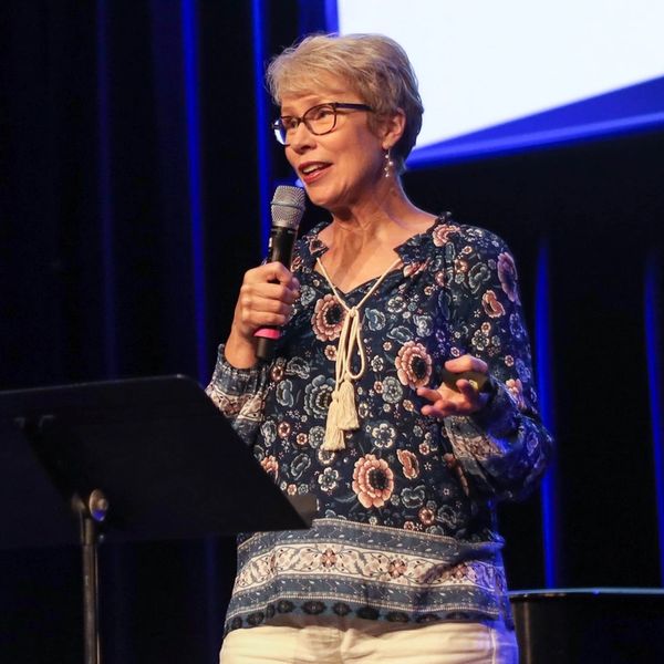 Nancy Zugschwert speaking at an event.