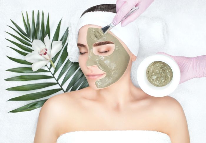 Woman with a face mask on.