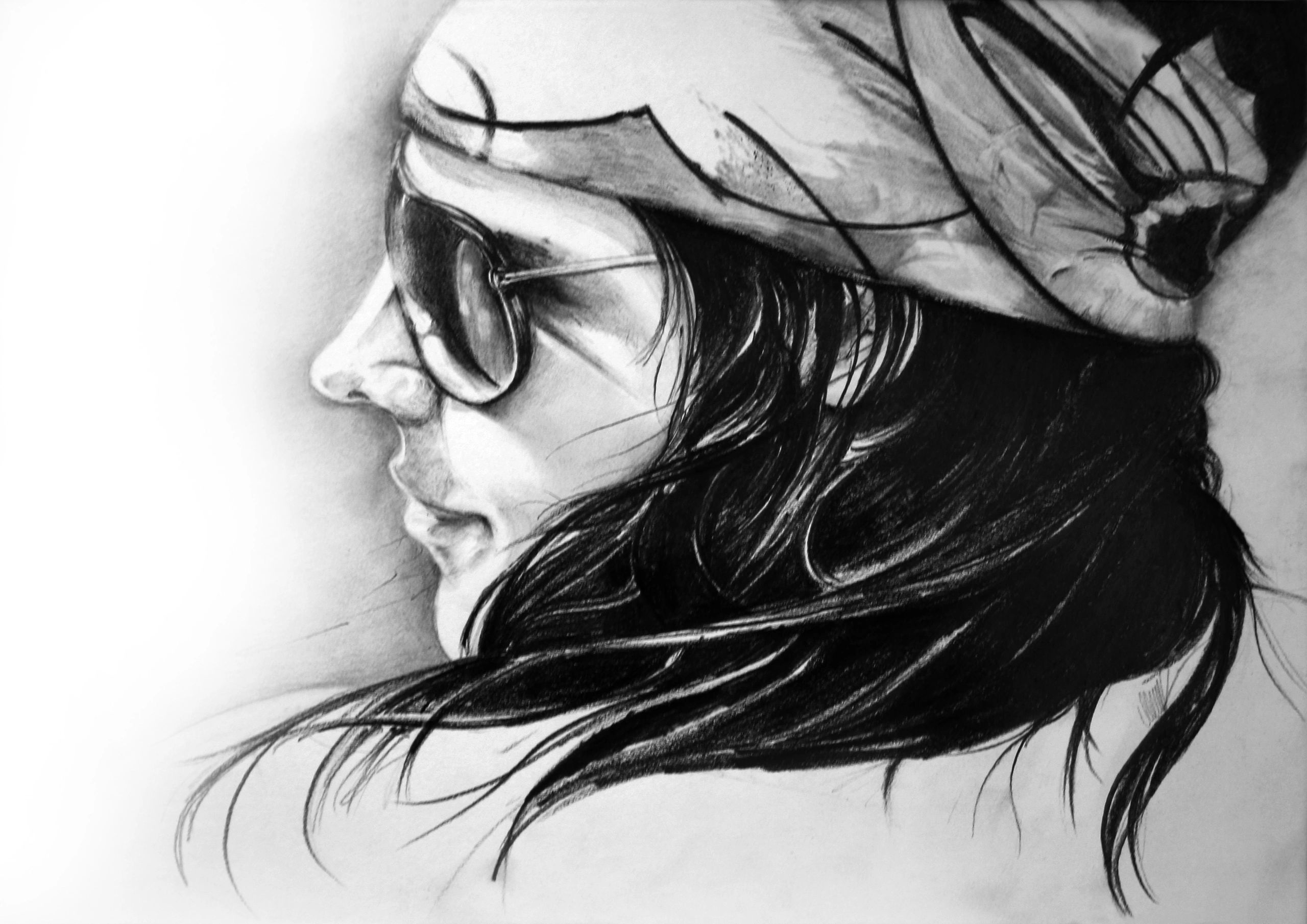 Black and white sketch of a woman in sunglasses and a headscarf.