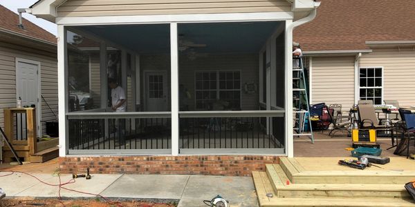 Screened in porch built by A&W Roofing in Charlotte, NC.