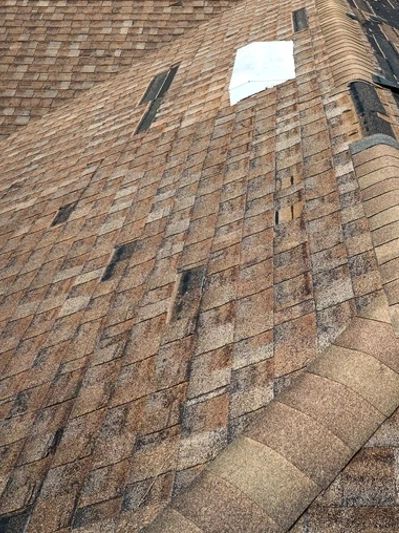 Wind Damage on a residential roof