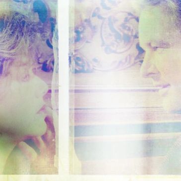 Two people facing each other with a hazy, artistic overlay.