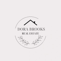 Dori Brooks Realtor RE/MAX River Realty