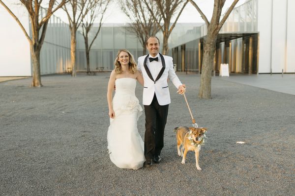 Bride and groom dog