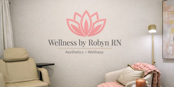Cozy wellness room with comfortable chairs and soft decor.