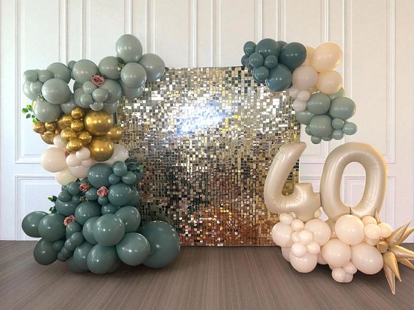 Elegant balloon decoration and backdrop for a 40th birthday celebration.