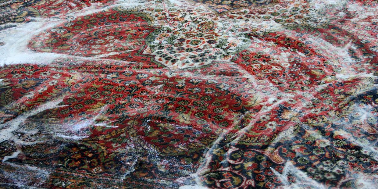 Intricate handwoven rug with traditional patterns and rich detailing