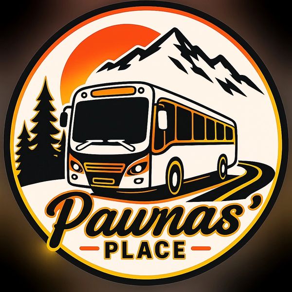 Logo of Paumas' Place with a bus, mountains, and trees.