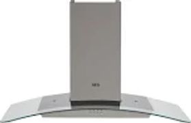 Modern stainless steel kitchen chimney with glass canopy.