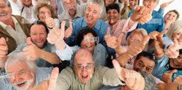 Group of people with thumbs up