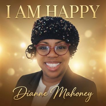 Smiling woman in glasses and a beaded hat with 'I AM HAPPY' text.