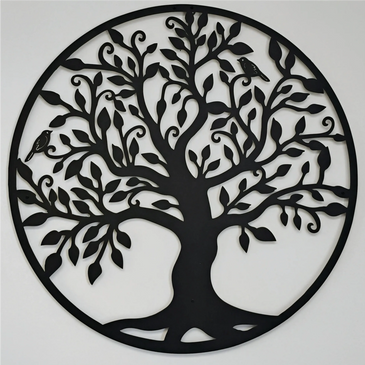 Black metal wall art of a tree with birds in a circular frame.
