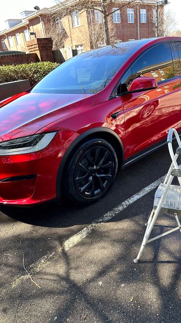 Red model x Tesla 