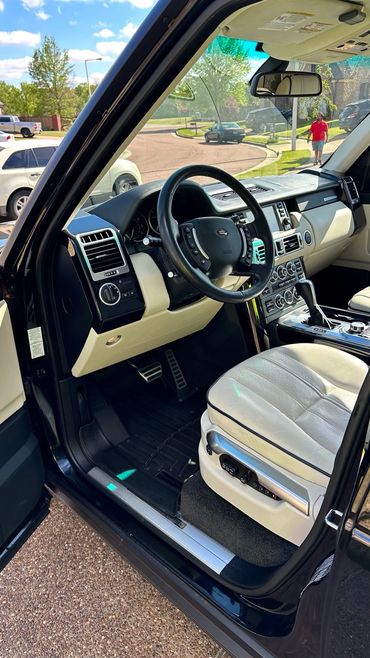 Drivers side interior of Range Rover detailed