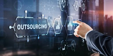 Businessman interacting with a digital outsourcing interface.
