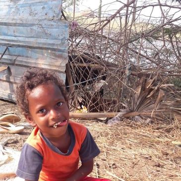 Tribal Kid eating food