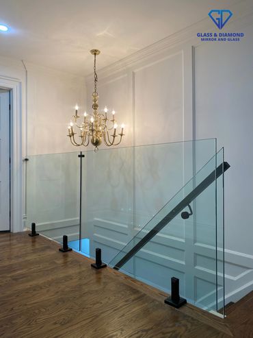 glass railing with black spigots