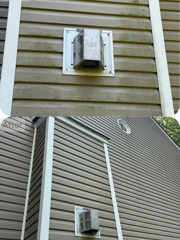 Side of a house showing dirty and clean vinyl siding before and after cleaning.