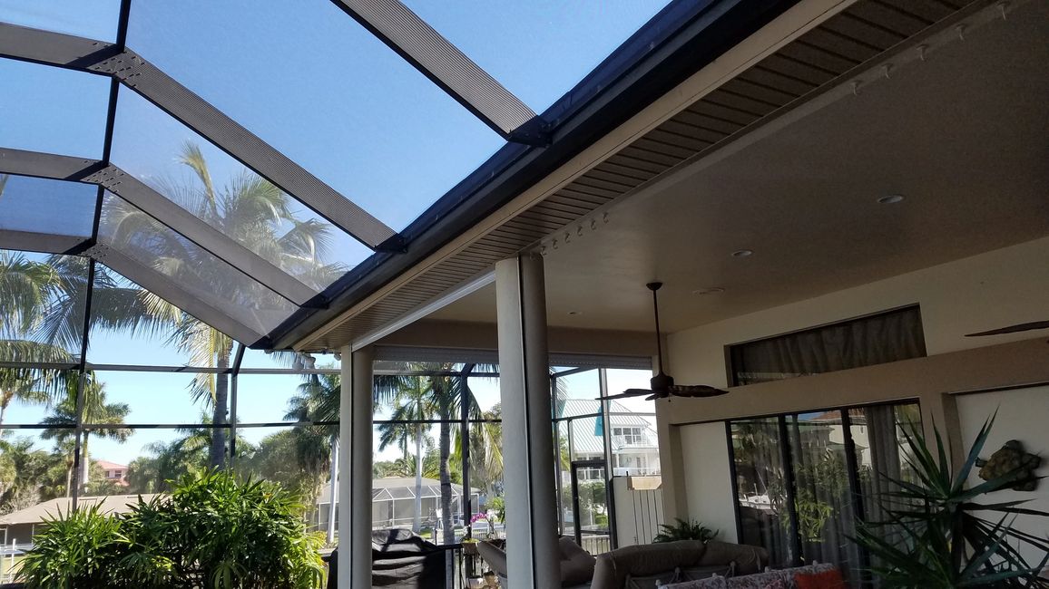 Very large hurricane grade roll down shutters, recessed into columns, and soffits.