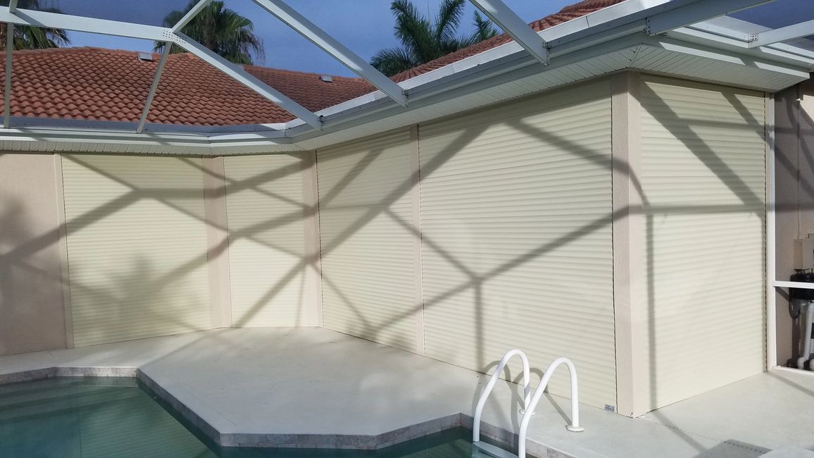 Roll shutters with custom hidden installation.