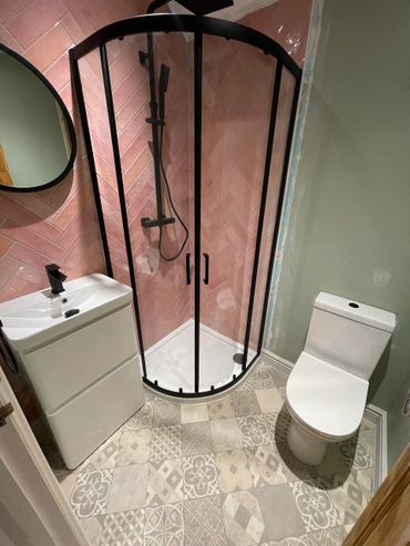 Modern bathroom with herringbone tiles