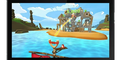 Gameplay scene showing a slingshot aiming at a wooden structure on an island.