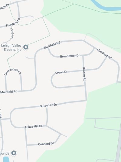 Map showing streets including Muirfield Rd, Brooke Rd, and Troon Dr in a residential area.