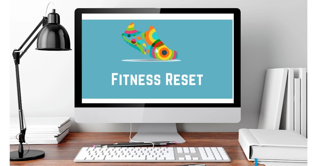 Computer screen displays a colorful fitness logo with shoes titled 'Fitness Reset'.