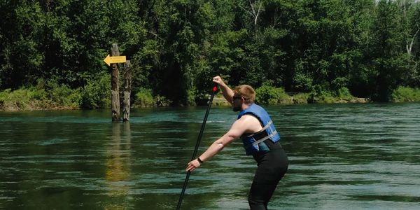 man paddling 