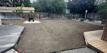 Old lawn removed, 10 yards of quality screened topsoil spread and leveled, now prepped for sod 