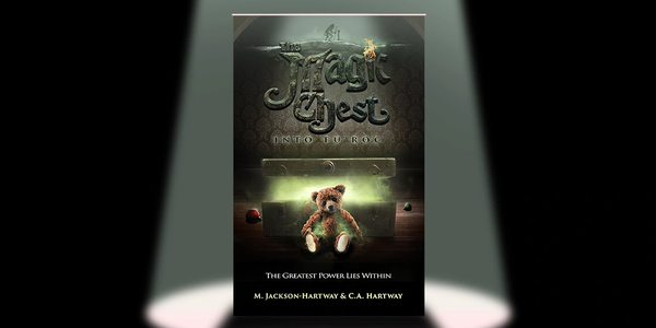 Book cover of 'The Magic Chest' with a glowing chest and teddy bear.