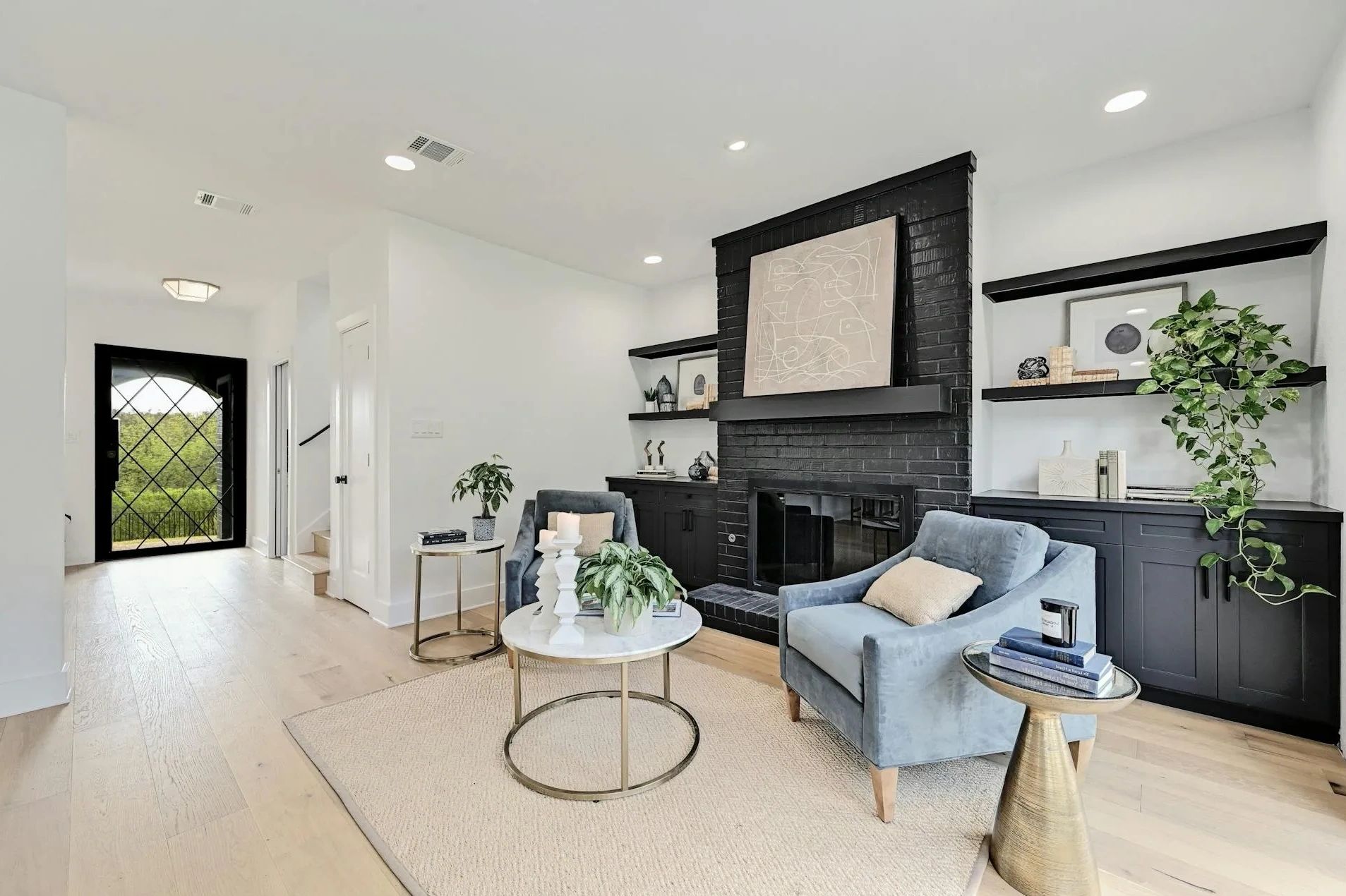 1987 remodeled sitting room with original brick fireplace 