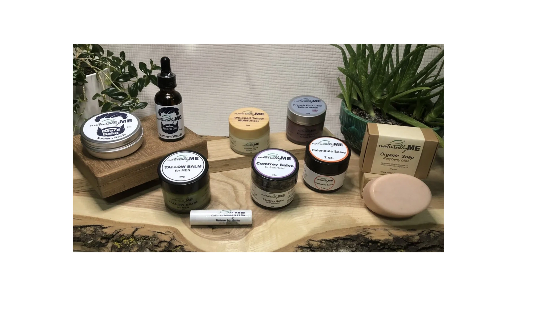 NaturallyME natural skincare products displayed on a wooden slab.
