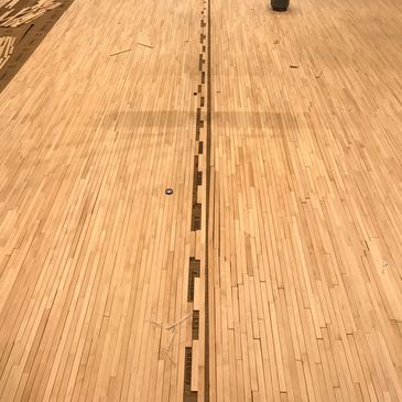 Installation of maple hardwood flooring. For gym floors in public and private schools. 