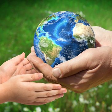 One hand holding planet earth