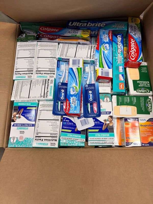 Each box is filled with medical supplies, personal hygiene products, baby formula, and non-perishabl