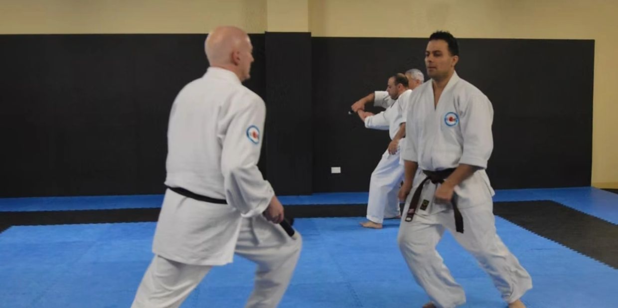 2 men practicing aikido