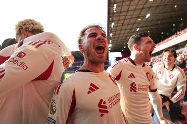Celebration image at a Liverpool FC match.