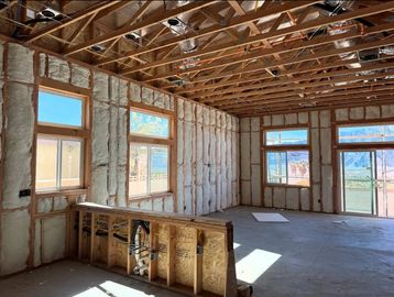 Image of post insulation framing with exposed ducting, ready for QII inspection.