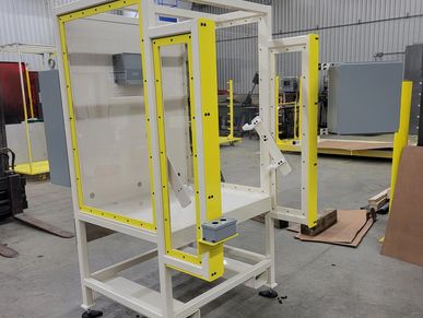 Custom manufactured machine frame including control panels