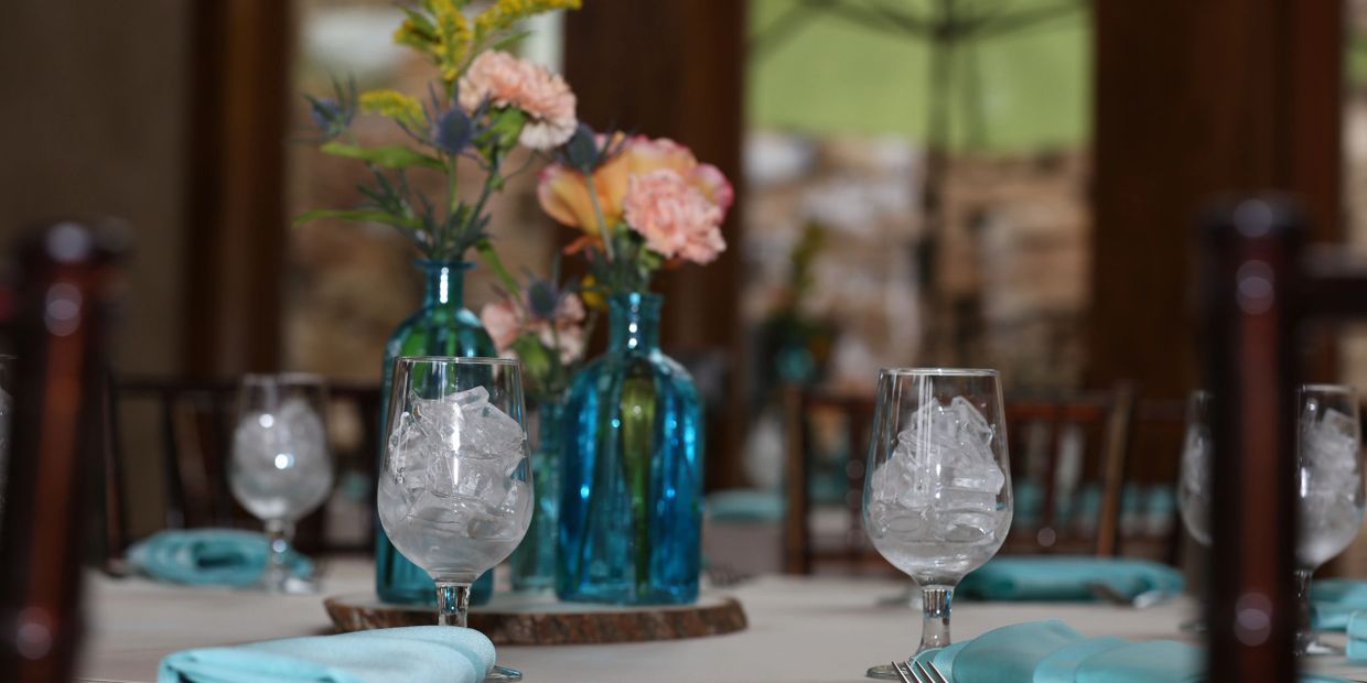 wedding table with blue place setting 