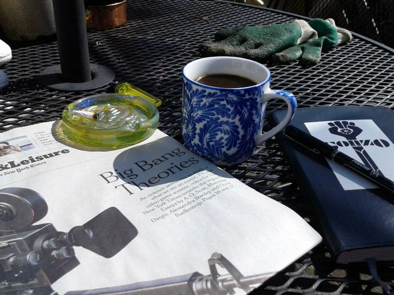 The perfect morning: A mug of coffee, a fat joint, a newspaper, a notebook and a pen. 